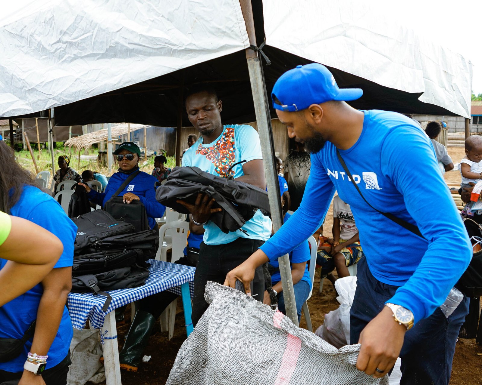 Mello volunteering, packing food donations
